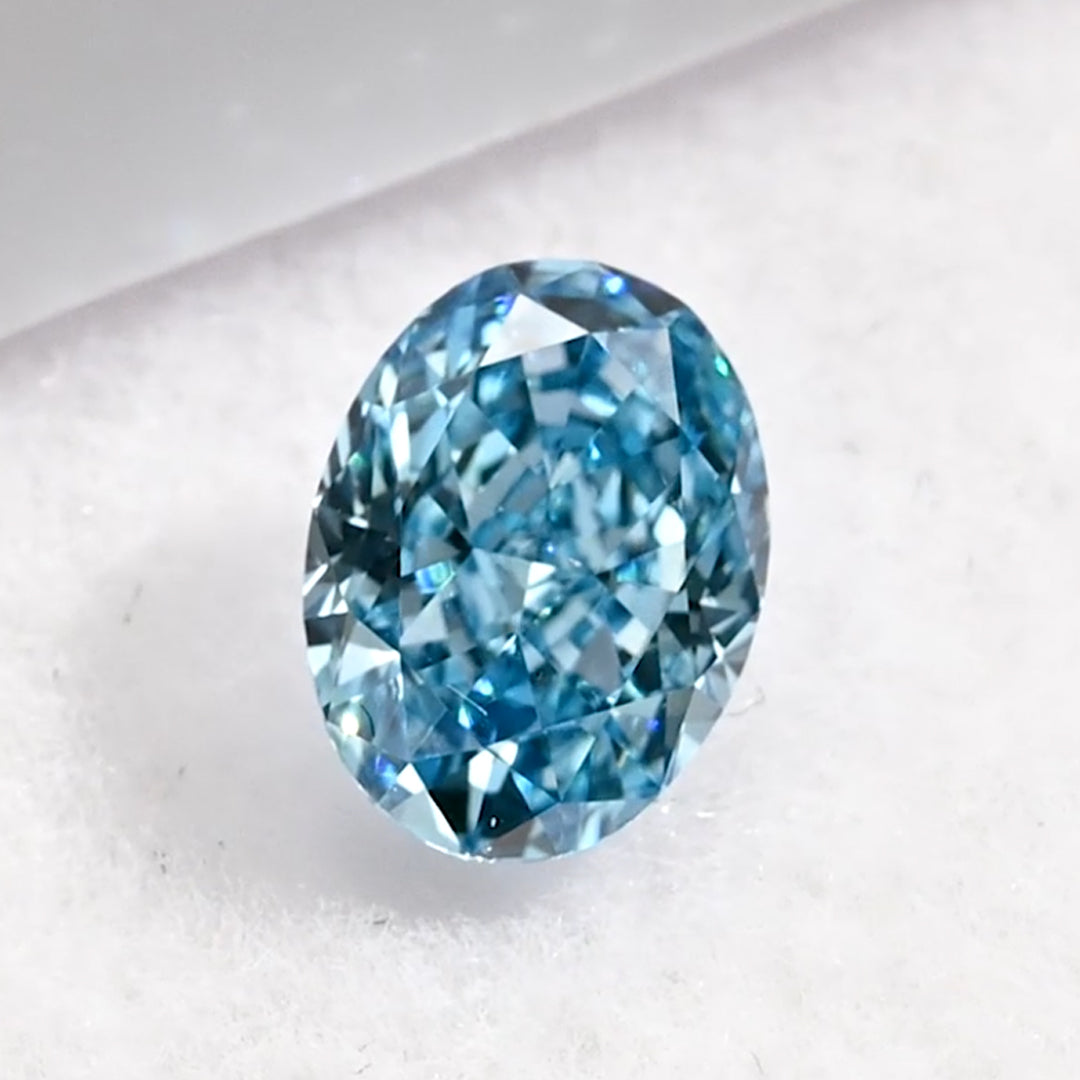 0.87 Carat Fancy Intense Greenish Blue Oval Cut Lab Grown Diamond